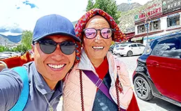 Taking a photo with Tibetan locals