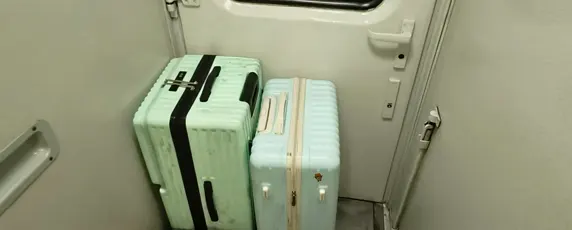 Luggage Closets at the Joint of the Carriages