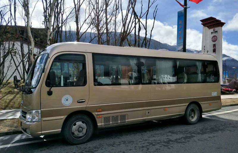 Front view of the left side of the mini bus