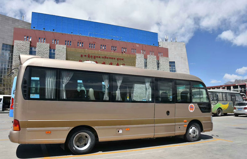 Back view of the right side of the mini bus
